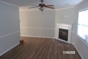 living room w/ electric fireplace