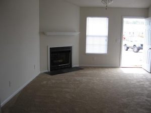 living room with a gas fireplace